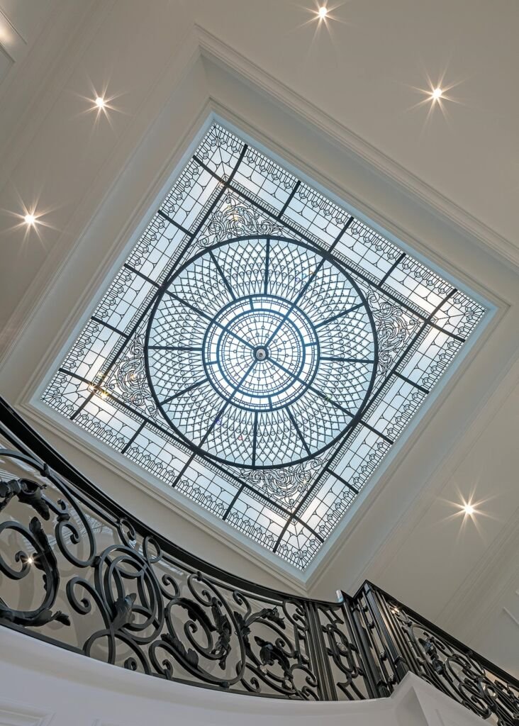 Best Barndominium Ceiling Ideas: Rustic Charm to Modern Chic 7 large stained and leaded glass domed ceiling grand entrance double height foyer