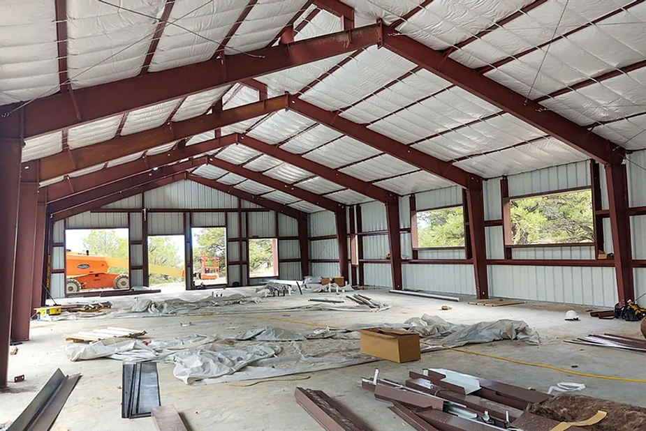 a large building with metal beams and metal beams