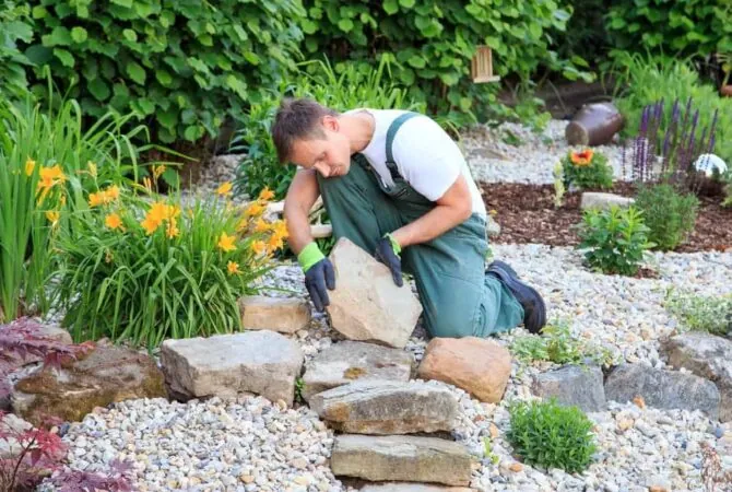 A man landscaping a beautiful garden